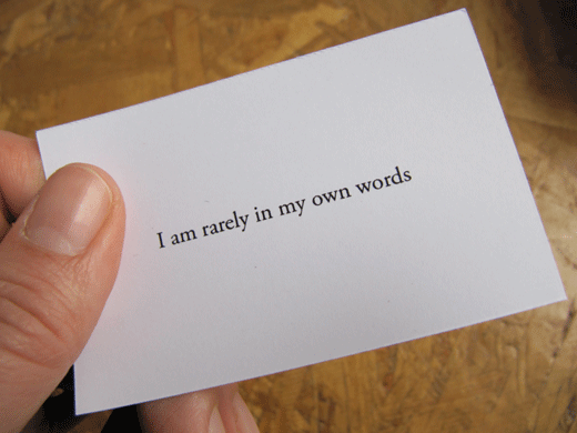 hand holding business card